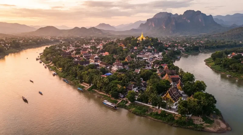 Golden stupa and traditional Lao architecture in Luang Prabang Old Town, UNESCO World Heritage site at the confluence of the Mekong and Nam Khan Rivers