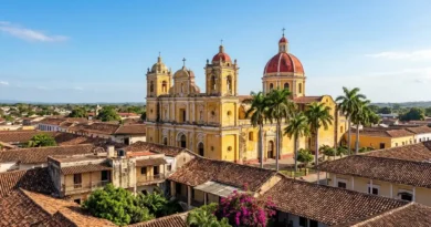 Granada cathedral in Nicaragua with yellow facade and red dome