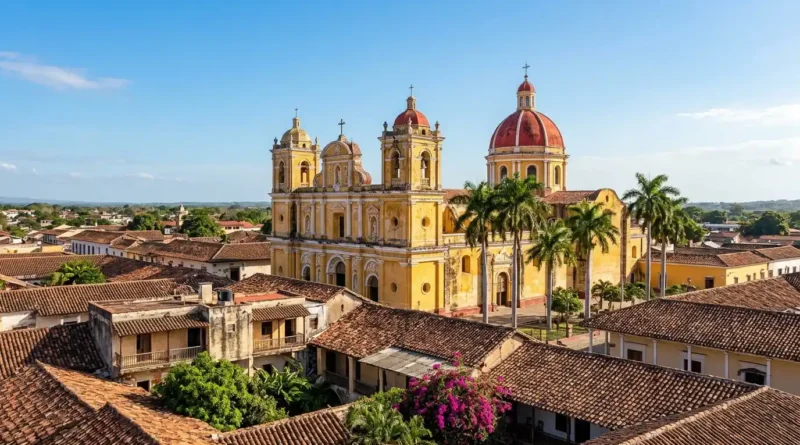 Granada cathedral in Nicaragua with yellow facade and red dome