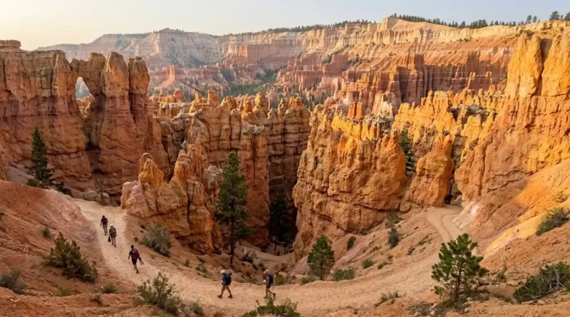 Hikers on the Queen’s Garden Trail among Bryce Canyon hoodoos below the rim